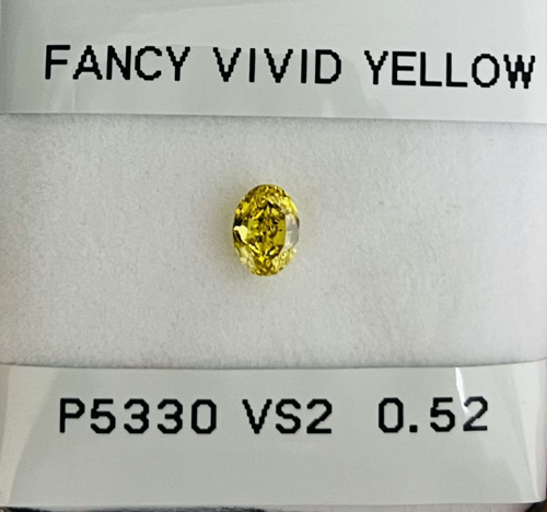 0.52 carat Fancy Vivid Yellow-VS2 Natūralus Oval Deimantas (1)
