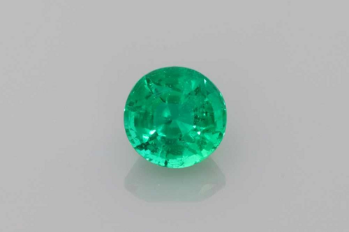 0.52 carat GREEN Round Smaragdas (1)