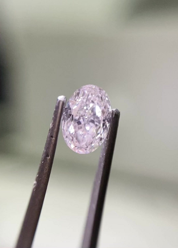0.59 carat Very Light  Pink-SI1 Natūralus Oval Deimantas (1)
