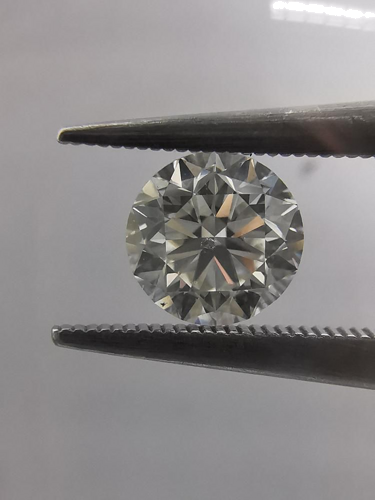 0.51 carat J-SI1 GD cut Natūralus Round Deimantas (1)