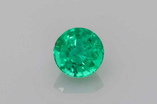 0.69 carat GREEN Round Smaragdas (1)