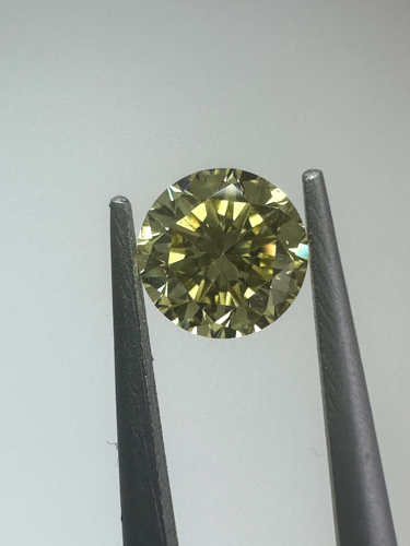 0.3 carat Fancy Intense Yellow-SI2 GD cut Natūralus Round Deimantas (1)