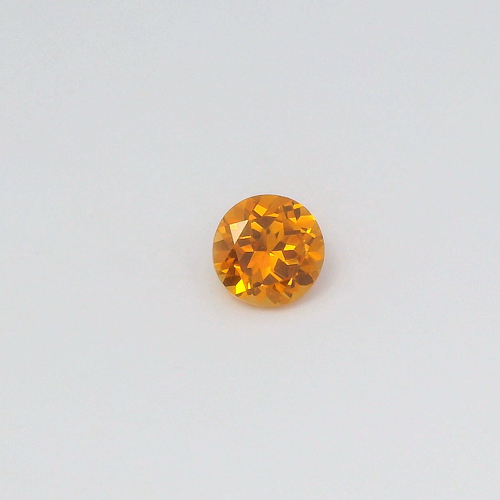 0.68 carat ORANGE Round Garnet (1)