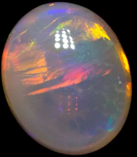0.3 carat MULTI_COLOR CABOCHON cut Oval Opal (1)