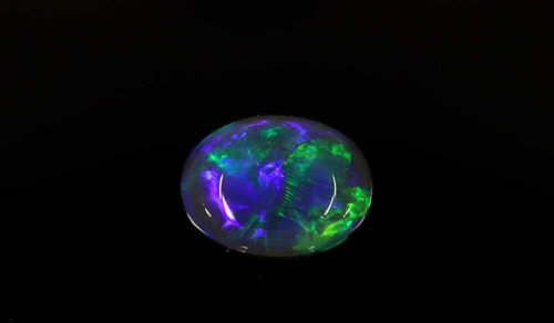 0.54 carat MULTI_COLOR Oval Opal (1)
