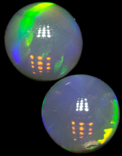 0.31 carat MULTI_COLOR CABOCHON cut Oval Opal (1)