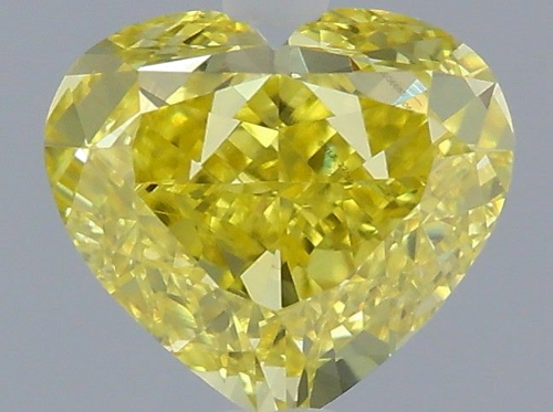 0.63 carat Fancy Vivid Yellow-VS2 Natūralus Heart Deimantas (1)