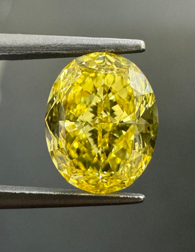 1.16 carat Fancy Vivid Yellow-VS2 Natūralus Oval Deimantas (1)