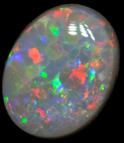 0.56 carat MULTI_COLOR CABOCHON cut Oval Opal (1)