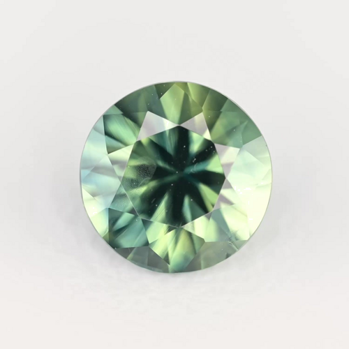 0.6 carat TEAL Round Safyras (1)