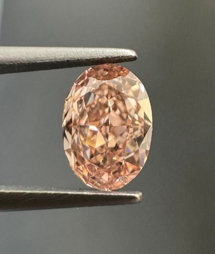 0.51 carat Fancy Orangey Pink-VS2 Natūralus Oval Deimantas (1)