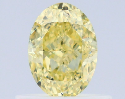 0.64 carat Faint Yellow-VVS2 Natūralus Oval Deimantas (1)