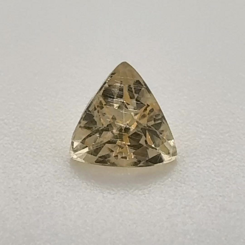 0.61 carat YELLOW Trilliant Topaz (1)