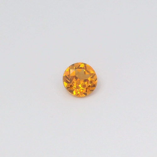 0.63 carat ORANGE Round Garnet (1)