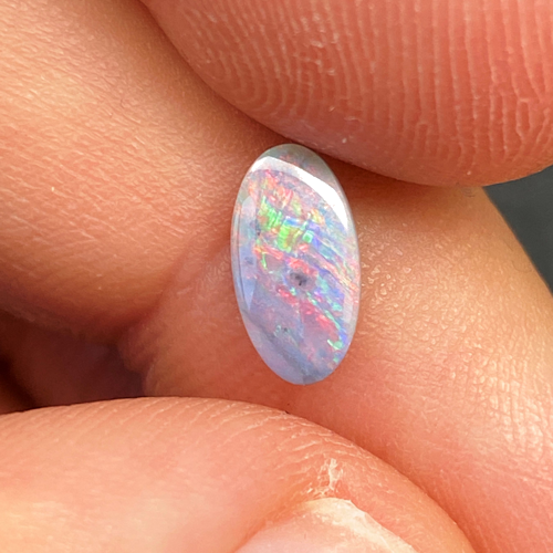 0.61 carat BLACK Oval Opal (1)