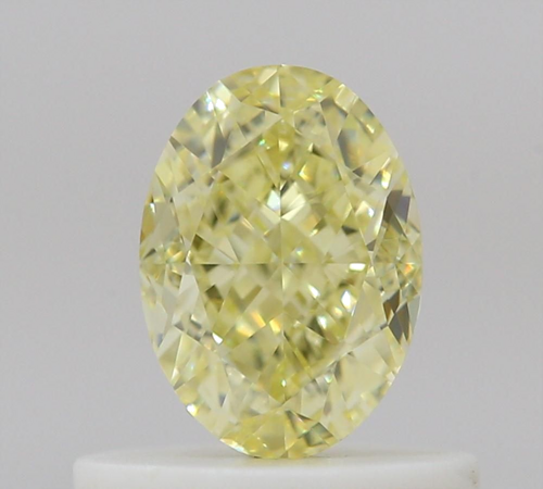 0.61 carat Fancy Yellow-VVS2 Natūralus Oval Deimantas (1)