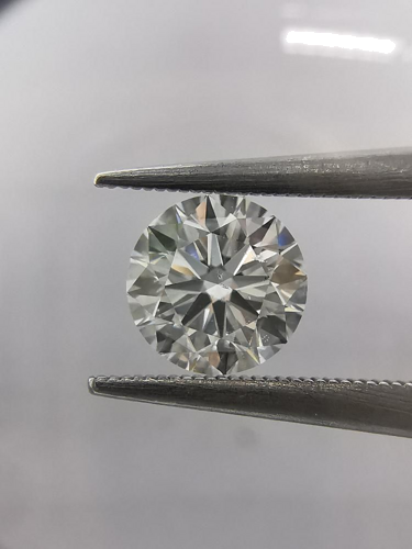 0.6 carat E-SI1 Excellent cut Natūralus Round Deimantas (1)