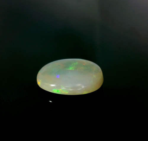 2.97 carat WHITE CABOCHON cut Oval Opal (1)