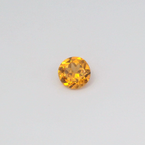 0.65 carat ORANGE Round Garnet (1)