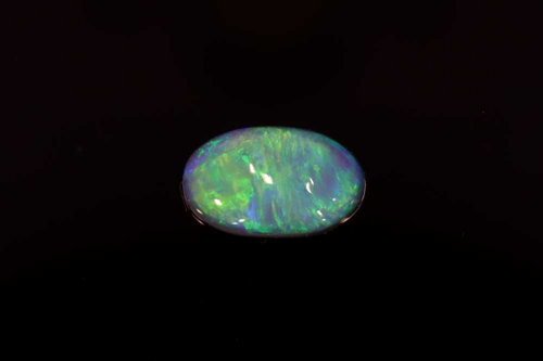 0.6 carat MULTI_COLOR Oval Opal (1)