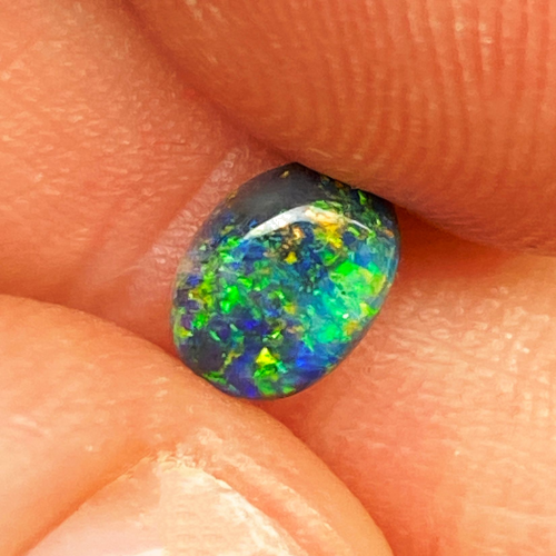 0.7 carat BLACK Oval Opal (1)