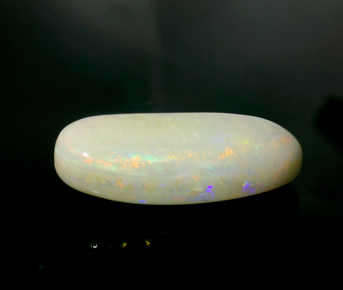 10.41 carat WHITE CABOCHON cut Oval Opal (1)