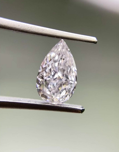 0.66 carat Faint Pink-SI1 Natūralus Pear Deimantas (1)