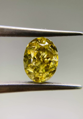 1.5 carat Fancy Brownish Yellow-SI1 Natūralus Oval Deimantas (1)
