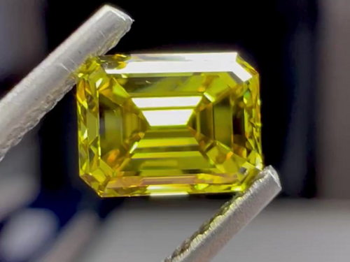 0.7 carat Fancy Deep Brownish Greenish Yellow-VS2 Natūralus Emerald Deimantas (1)