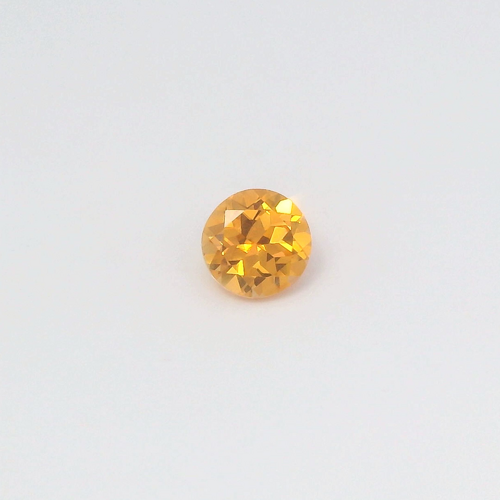 0.67 carat ORANGE Round Garnet (1)
