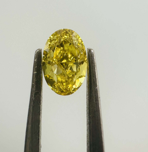0.5 carat Fancy Vivid  Yellow-VS1 Natūralus Oval Deimantas (1)