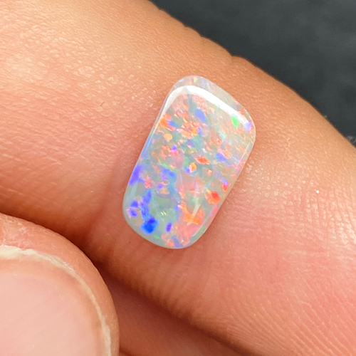 0.69 carat BLACK Trilliant Opal (1)
