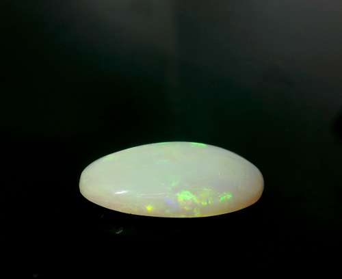 4.02 carat WHITE CABOCHON cut Oval Opal (1)