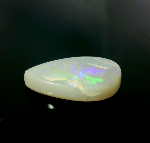 5.53 carat WHITE CABOCHON cut Pear Opal (1)