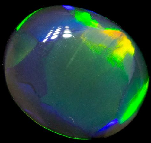 0.37 carat MULTI_COLOR CABOCHON cut Oval Opal (1)