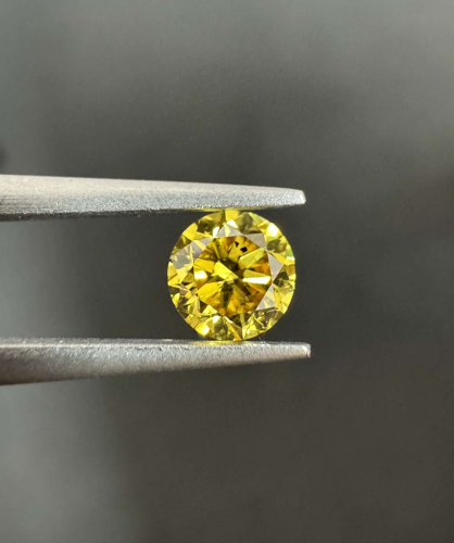 0.4 carat Fancy Vivid Yellow-SI2 GD cut Natūralus Round Deimantas (1)
