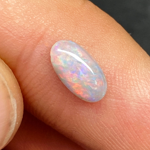 0.66 carat BLACK Oval Opal (1)