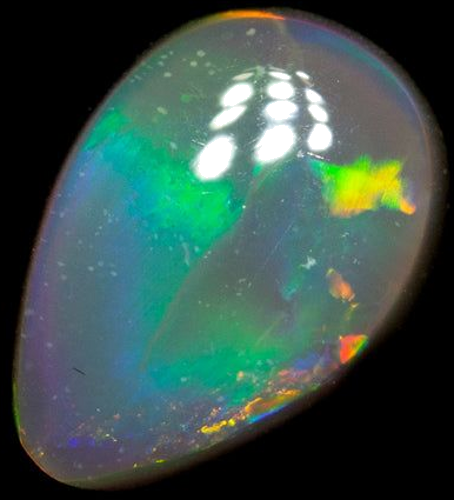 0.51 carat MULTI_COLOR CABOCHON cut Oval Opal (1)