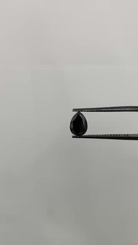 0.57 carat Fancy Black-VVS2 Natūralus Pear Deimantas (1)