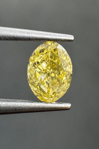 0.51 carat Fancy Intense Yellow-VS2 Natūralus Oval Deimantas (1)