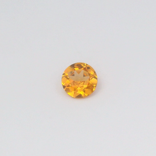 0.63 carat ORANGE Round Garnet (1)