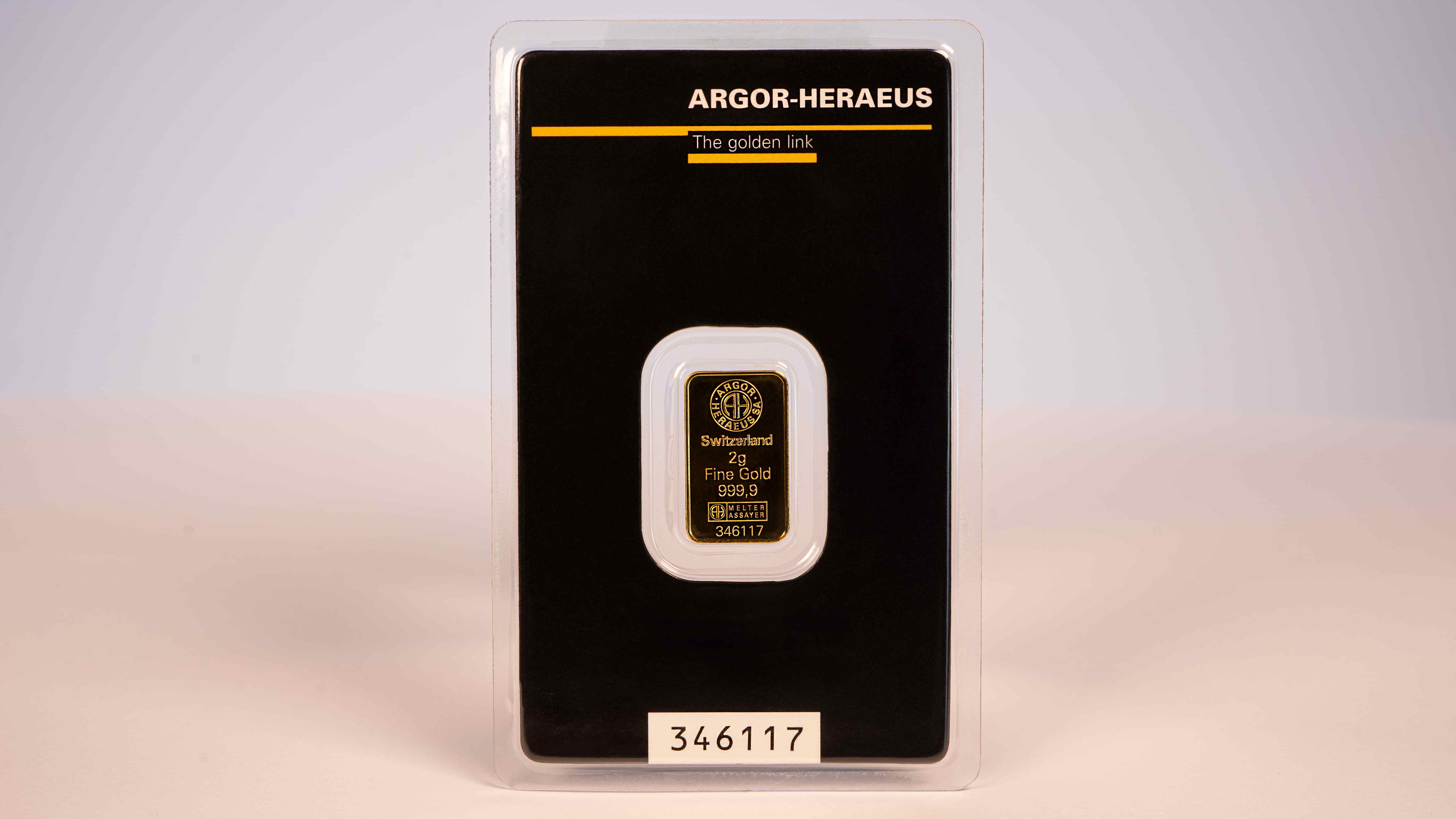 argor-heraeus one gram gold bar in a black case